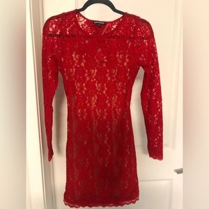 Red lace long sleeve mini dress with open back.